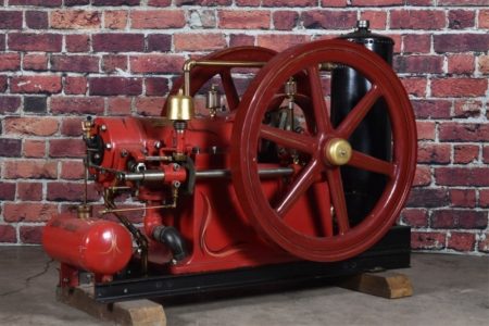 A side view of a red gas engine